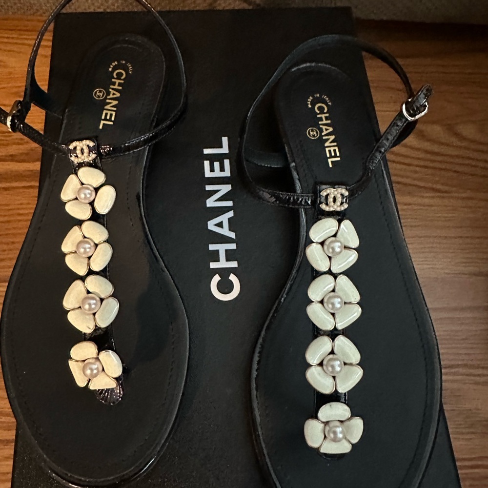 CHANEL Black Sandals with White Floral Accent